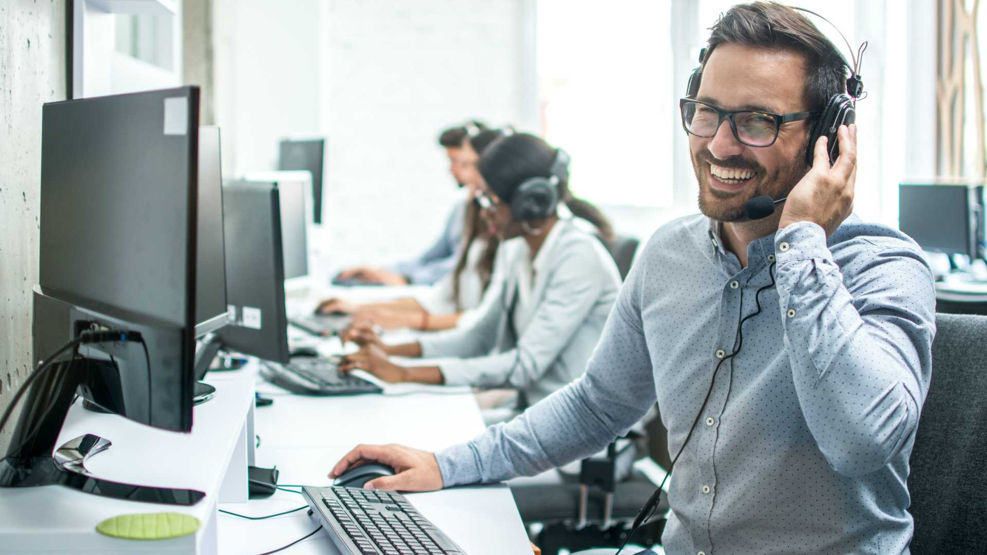 unknown persons using computer indoors