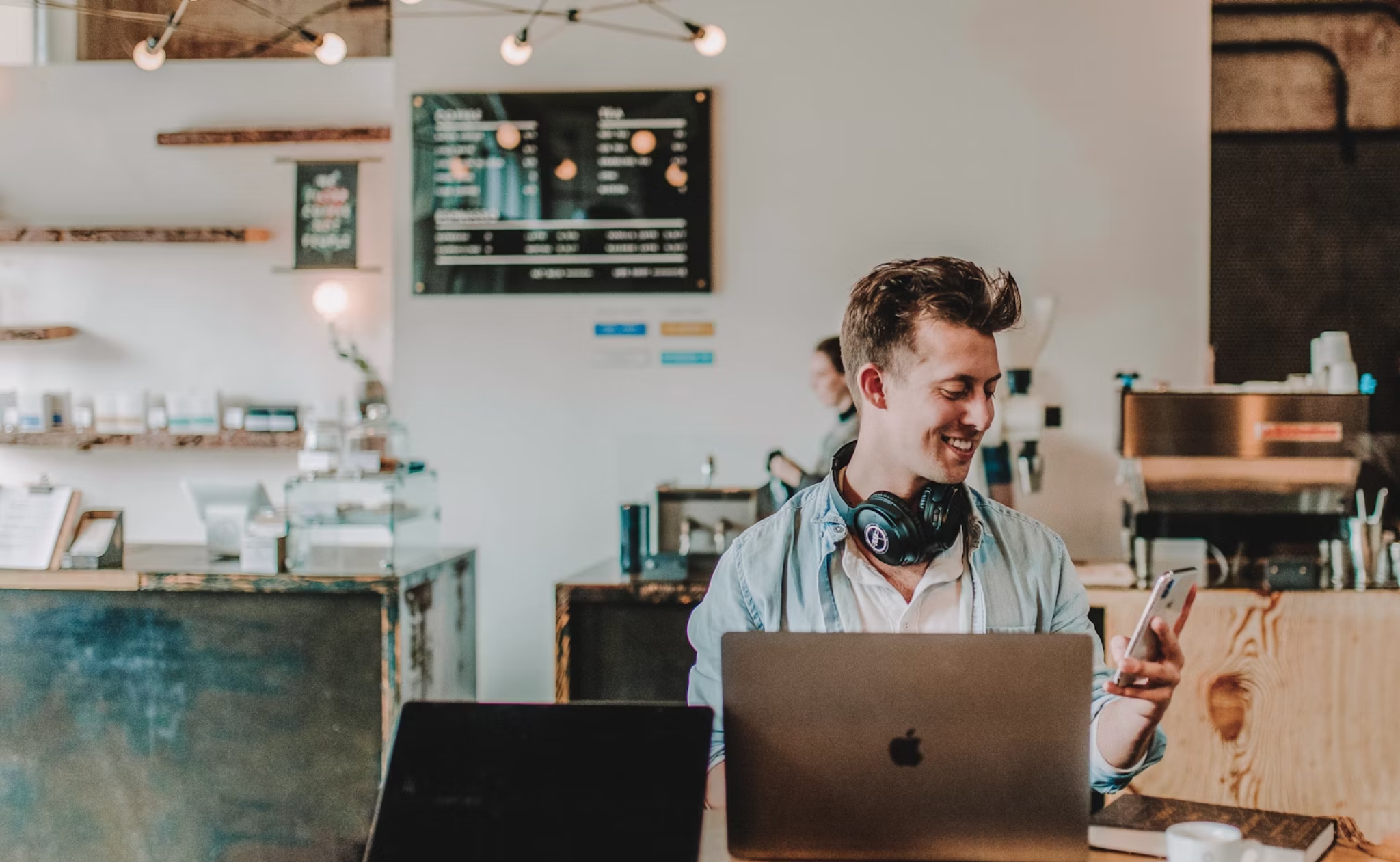 Businessman working and writing notes in office