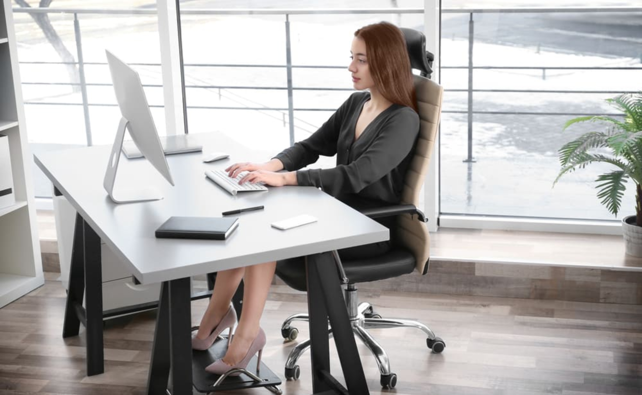 people sitting on chair in front of computer