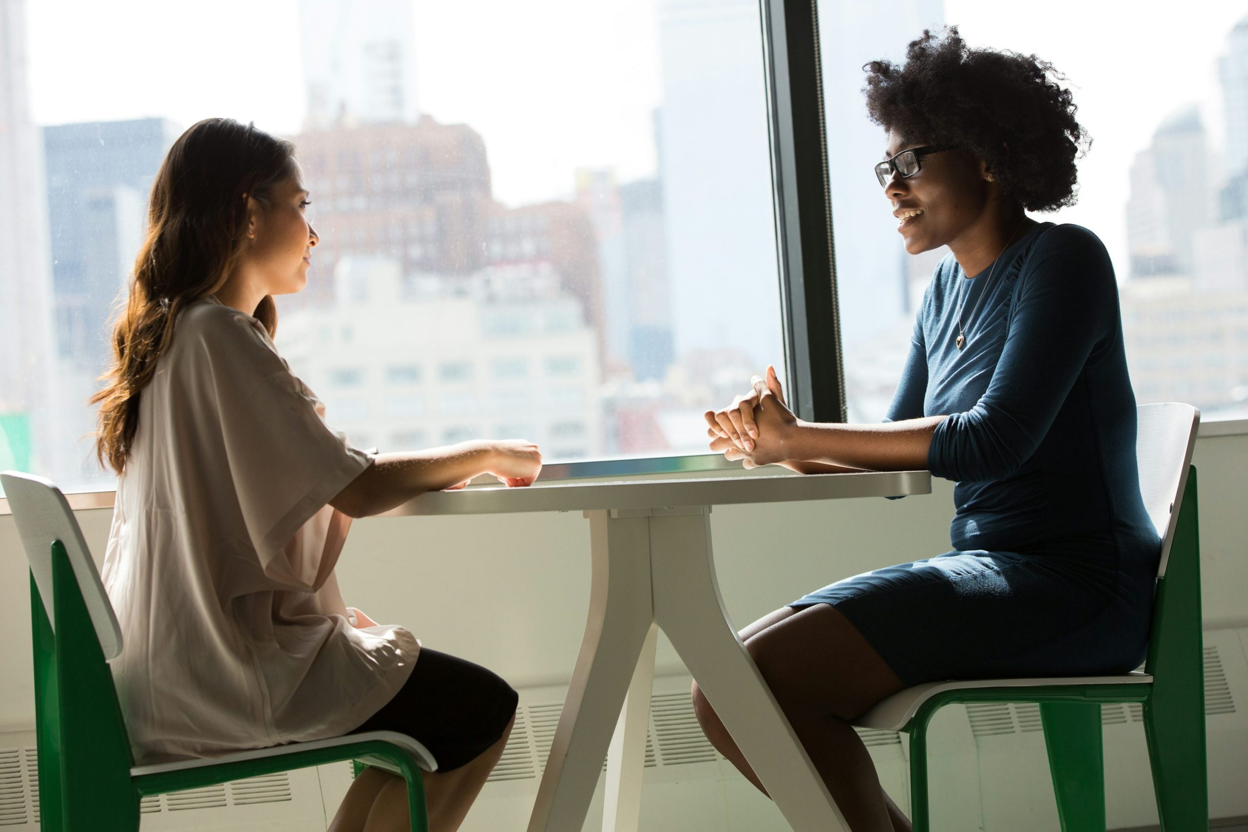 two women near tables