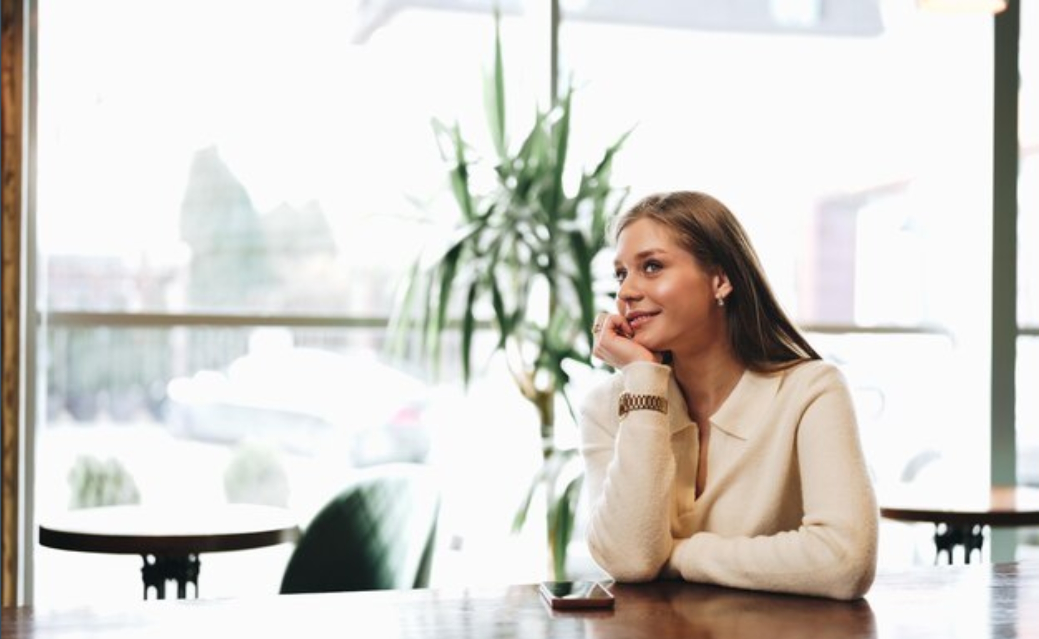 woman sitting at table